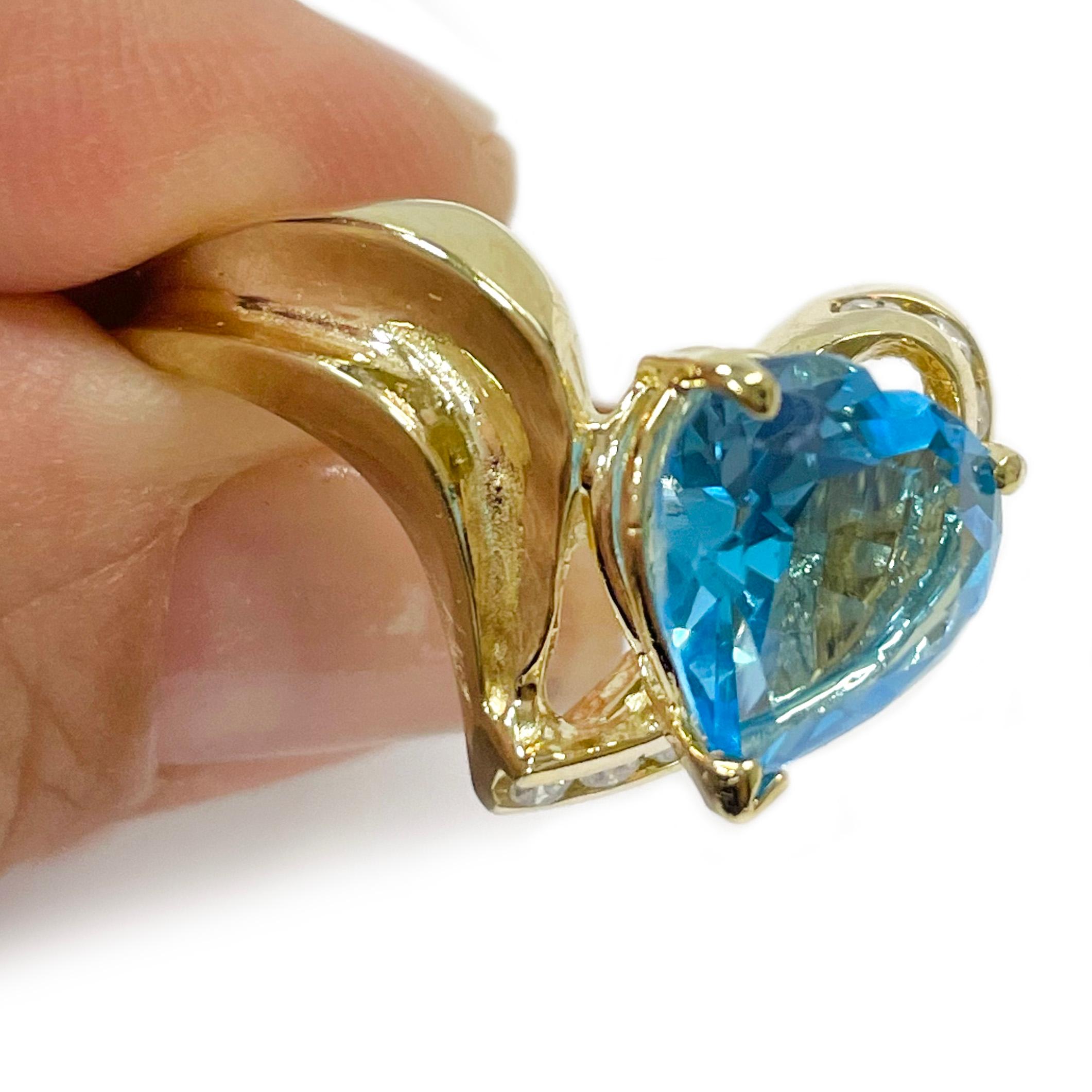 Oval Cut Yellow Gold Swiss Blue Topaz Heart Diamond Ring For Sale