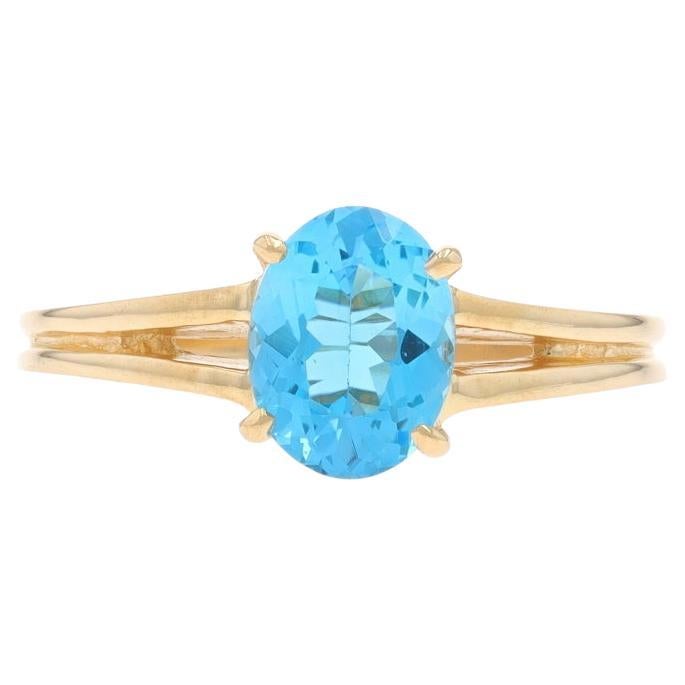Bague solitaire en or jaune avec topaze bleue suisse - 14k Oval 1.60ct