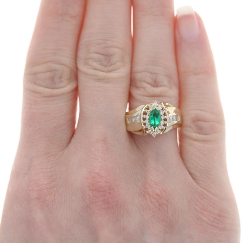 Size: 6 3/4
Sizing Fee: Up 2 sizes for $35 or Down 1 size for $35

Metal Content: 14k Yellow Gold & 14k White Gold

Stone Information
Synthetic Emerald
Carat(s): .60ct
Cut: Marquise
Color: Green

Natural Diamonds
Carat(s): .25ctw
Cut: Baguette &