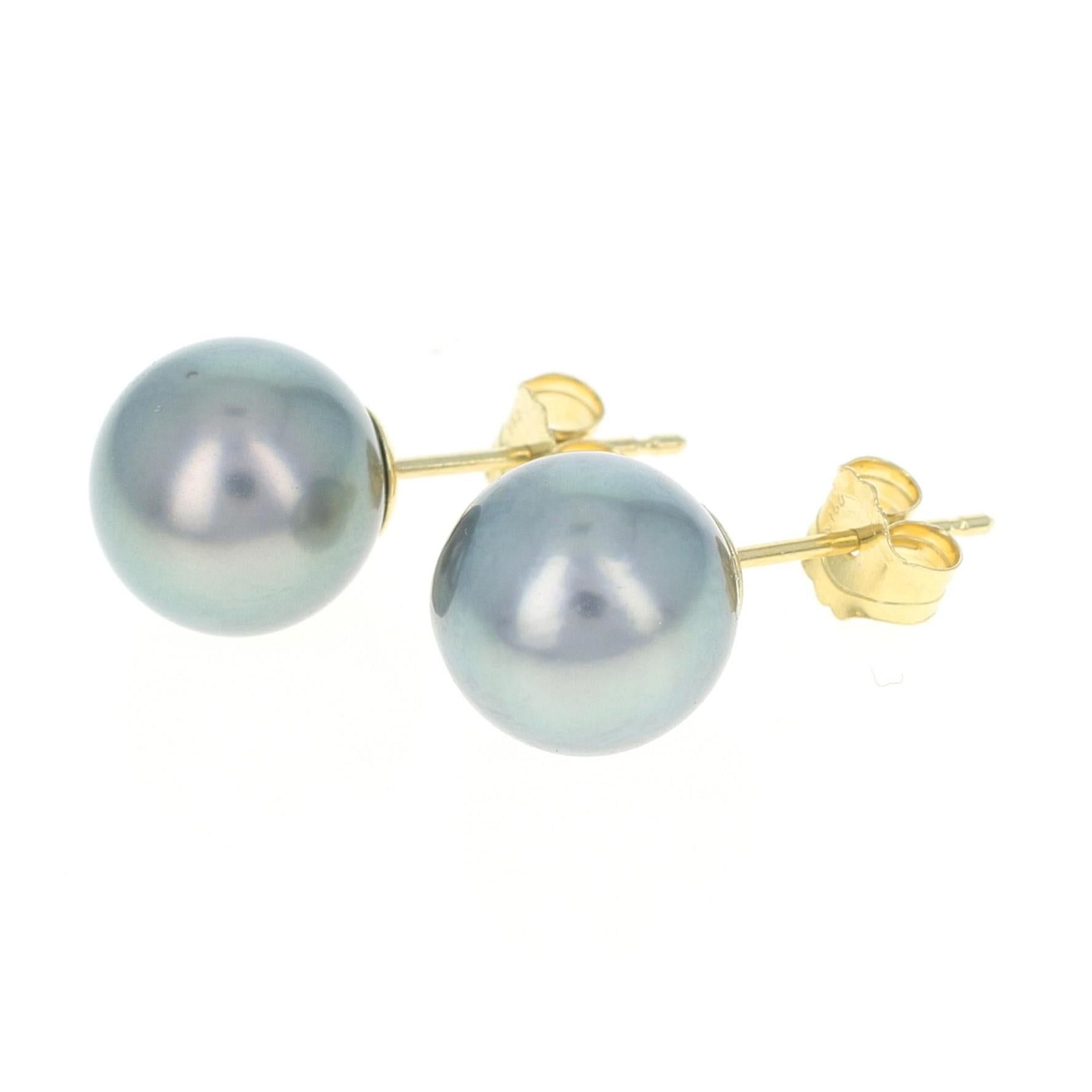 Step out in style wearing this timeless pair of pearl earrings! Composed of glowing 18k yellow gold and fashioned in a sophisticated stud style, these earrings showcase genuine Tahitian pearls which have a charcoal gray tone that is just simply
