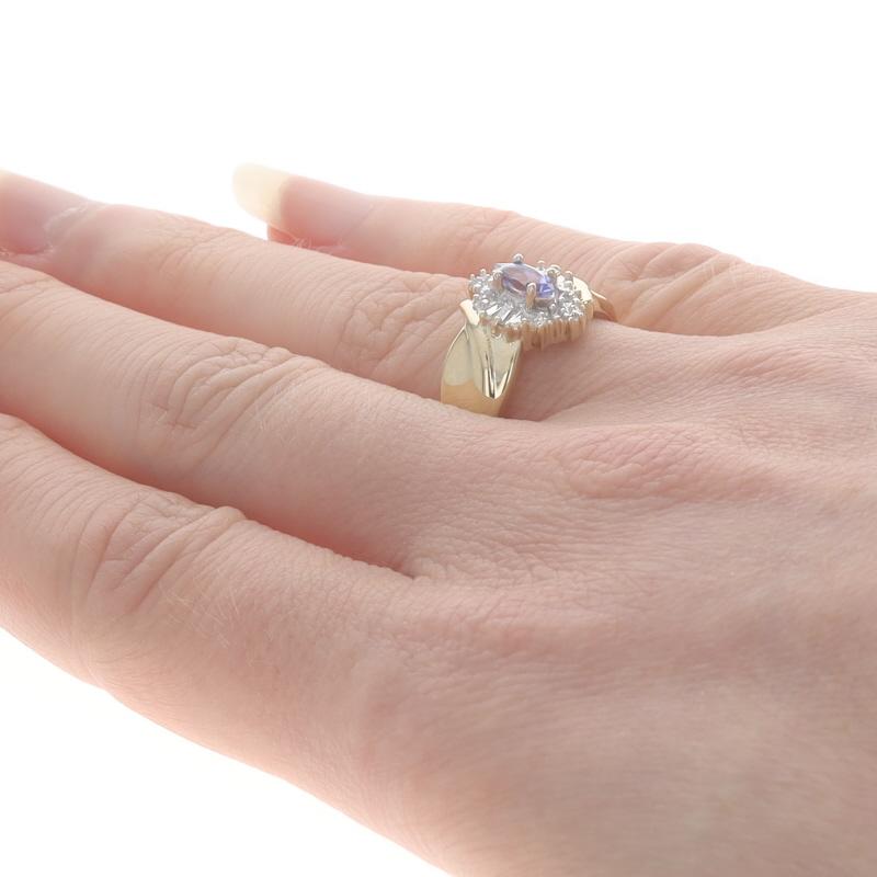 Yellow Gold Tanzanite & Diamond Bypass Ring - 10k Marquise .23ctw Halo-Inspired In Excellent Condition For Sale In Greensboro, NC