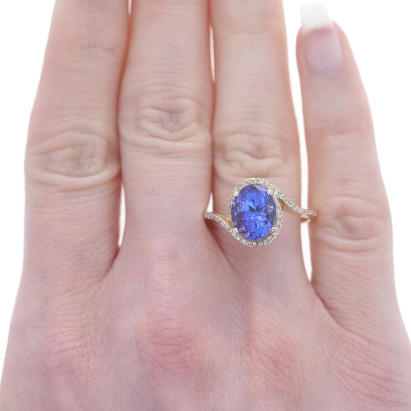Size: 8 3/4
Sizing Fee: Up 2 sizes for $35

Metal Content: 14k Yellow Gold

Stone Information
Natural Tanzanite
Treatment: Routinely Enhanced
Carat(s): 3.00ct
Cut: Oval
Color: Purple

Natural Diamonds
Carat(s): .20ctw
Cut: Single
Color: G -