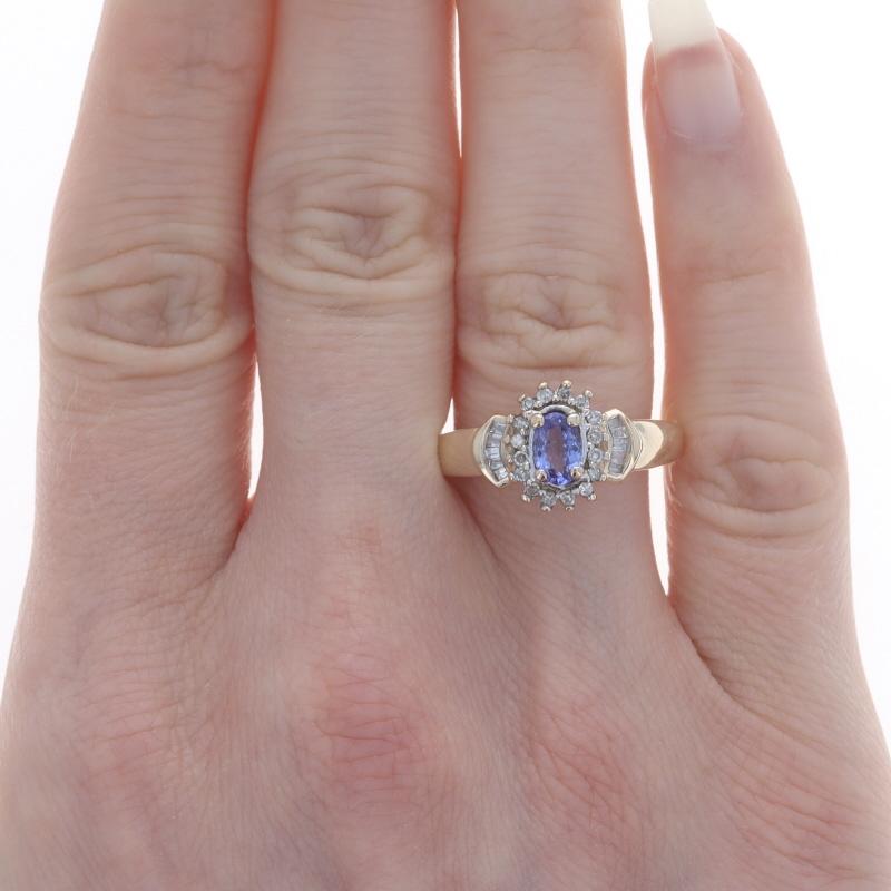 Size: 8
Sizing Fee: Up 1 size for $35 or Down 1 size for $30

Metal Content: 10k Yellow Gold & 10k White Gold

Stone Information

Natural Tanzanite
Treatment: Routinely Enhanced
Carat(s): .48ct
Cut: Oval
Color: Purple

Natural Diamonds
Carat(s):