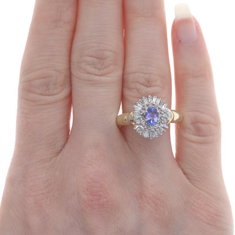 Size: 9
Sizing Fee: Up 2 sizes for $35 or Down 1 1/2 sizes for $30

Metal Content: 14k Yellow Gold & 14k White Gold

Stone Information

Natural Tanzanite
Treatment: Routinely Enhanced
Carat(s): .48ct
Cut: Oval
Color: Purple

Natural