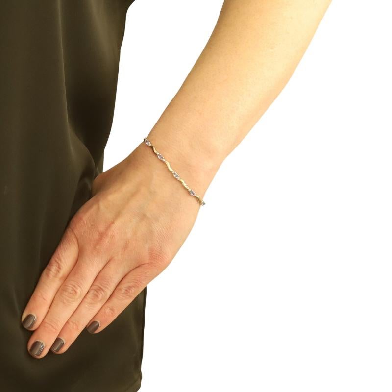 Pulsera de eslabones de oro amarillo con tanzanita y diamantes 7