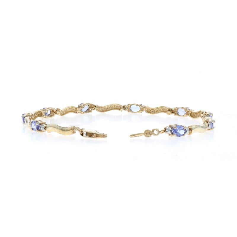 Pulsera de eslabones de oro amarillo con tanzanita y diamantes 7