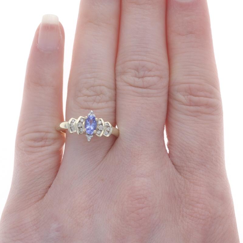 Size: 7 1/2
Sizing Fee: Up 1 1/2 sizes for $30 or Down 1 size for $30

Metal Content: 10k Yellow Gold & 10k White Gold

Stone Information

Natural Tanzanite
Treatment: Routinely Enhanced
Carat(s): .48ct
Cut: Oval
Color: Purple

Natural