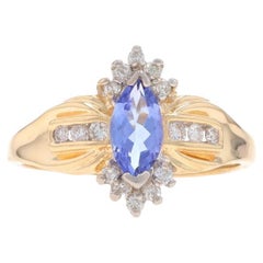 Anillo de oro amarillo con diamante tanzanita 14k marquesa .66ctw