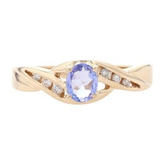 Vintage Yellow Gold Tanzanite 
Diamond Ring, 14k Oval Cut .40ctw Twist Bypass
