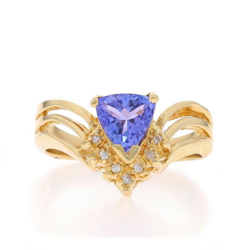 Size: 7 1/4
Sizing Fee: Up 2 sizes for $40 or Down 1 size for $40

Metal Content: 14k Yellow Gold

Stone Information

Natural Tanzanite
Treatment: Routinely Enhanced
Carat(s): 1.40ct
Cut: Trillion
Color: Purple

Natural Diamonds
Carat(s):