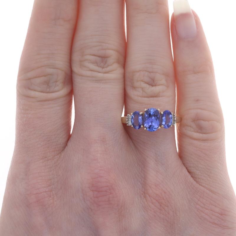Size: 7 1/4
Sizing Fee: Up 1 size for $35 or Down 1 size for $35

Metal Content: 14k Yellow Gold & 14k White Gold

Stone Information
Natural Tanzanites
Treatment: Routinely Enhanced
Carat(s): 1.90ctw
Cut: Oval
Color: Purple

Natural