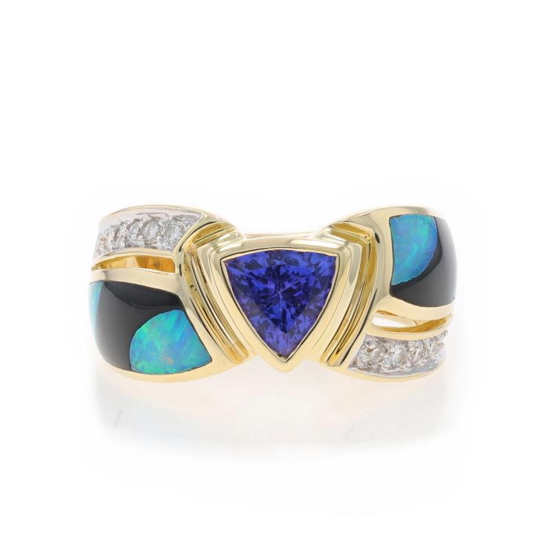 Size: 6 1/4

Metal Content: 14k Yellow Gold & 14k White Gold

Stone Information

Natural Tanzanite
Treatment: Routinely Enhanced
Carat(s): 1.10ct (carat stamp)
Cut: Trillion
Color: Purple

Natural Opal
Cut: Inlay

Natural Onyx
Cut: Inlay
Color: