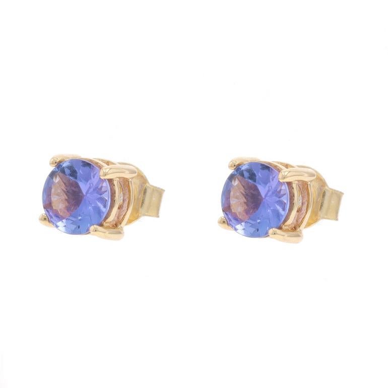Metal Content: 14k Yellow Gold

Stone Information

Natural Tanzanites
Treatment: Routinely Enhanced
Carat(s): 1.50ctw
Cut: Round
Color: Purple

Total Carats: 1.50ctw

Style: Stud
Fastening Type: Butterfly Closures

Measurements

Tall: 1/4