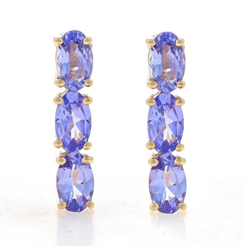 Metal Content: 10k Yellow Gold

Stone Information

Natural Tanzanites
Treatment: Routinely Enhanced
Carat(s): 1.20ctw
Cut: Oval
Color: Purple

Total Carats: 1.20ctw

Style: Three-Stone Drop
Fastening Type: Butterfly Closures

Measurements

Tall: