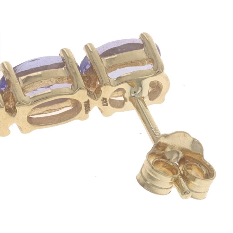 Women's Yellow Gold Tanzanite Three-Stone Drop Earrings - 10k Oval 1.20ctw Pierced For Sale