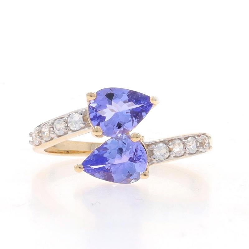 Size: 9
Sizing Fee: Up 2 sizes for $35 or Down 1 size for $25

Metal Content: 10k Yellow Gold & 10k White Gold

Stone Information

Natural Tanzanites
Treatment: Routinely Enhanced
Carat(s): 1.80ctw
Cut: Pear
Color: Purple

Natural Topaz
Carat(s):