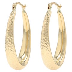 Orecchini a cerchio affusolati in oro giallo - 14k - forati