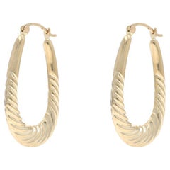 Orecchini a cerchio ovali affusolati in oro giallo 14k a spirale