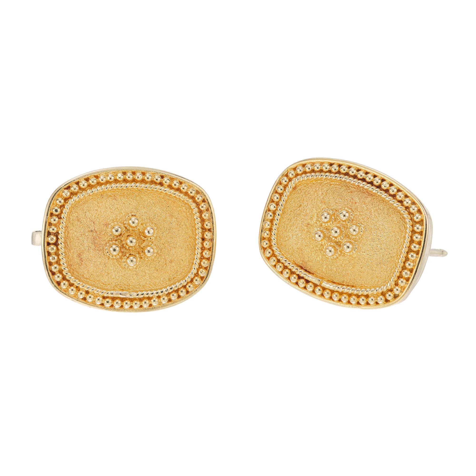 Textured 18k yellow gold clip post earrings. Safe secure clip backs.

18k yellow gold 
Stamped: 750
11.3 grams
Top to bottom: 17.8mmor 11/16 Inches 
Width: 14.6mm or .5 Inch
Depth or thickness: 4.9mm 
 