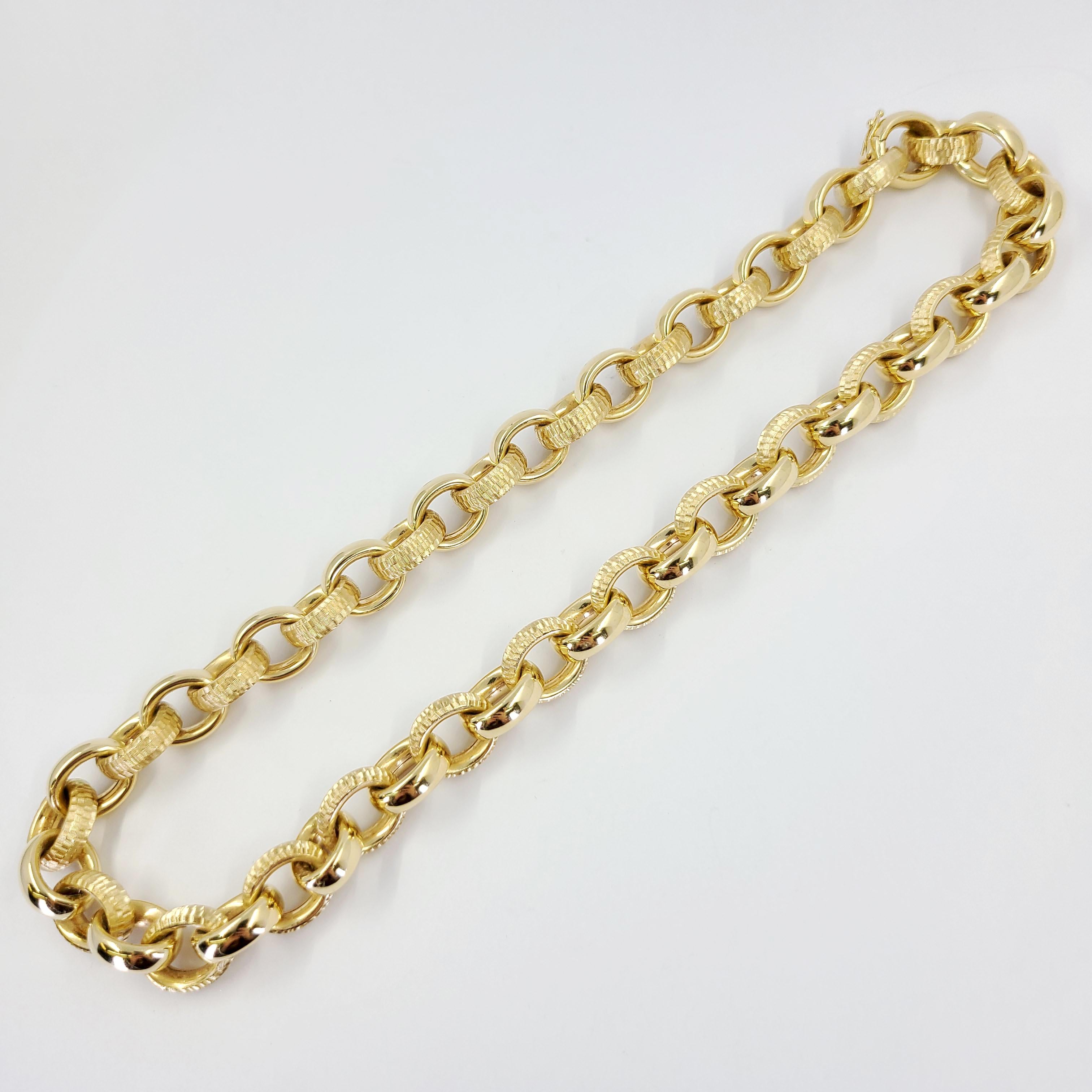 14 Karat Yellow Gold Oval Link Necklace Featuring Textured Design. 18 Inches Long. Finished Weight Is 79.5 Grams. Matching Bracelet Available.