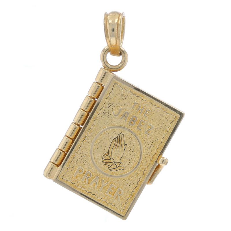 Metal Content: 14k Yellow Gold

Theme: The Jabez Prayer Book, Faith, I Chronicles 4:10
Features: Hinged Pendant Opens

Measurements
Tall (from stationary bail): 7/8