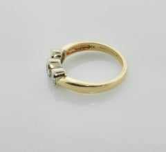 Yellow Gold Three-Stone Ring .75 Carat, circa 1950s