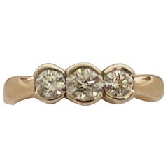 Yellow Gold Three-Stone Ring .75 Carat, circa 1950s