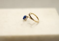 Yellow Gold Tibetan Ring with Vivid Sapphire and Diamonds
