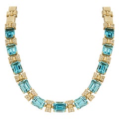 Collier en or jaune avec topaze et diamant
