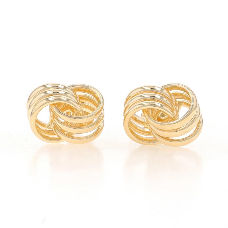 Metal Content: 14k Yellow Gold

Style: Stud
Fastening Type: Butterfly Closures
Theme: Triple Circle Link, Knot

Measurements
Tall: 13/32