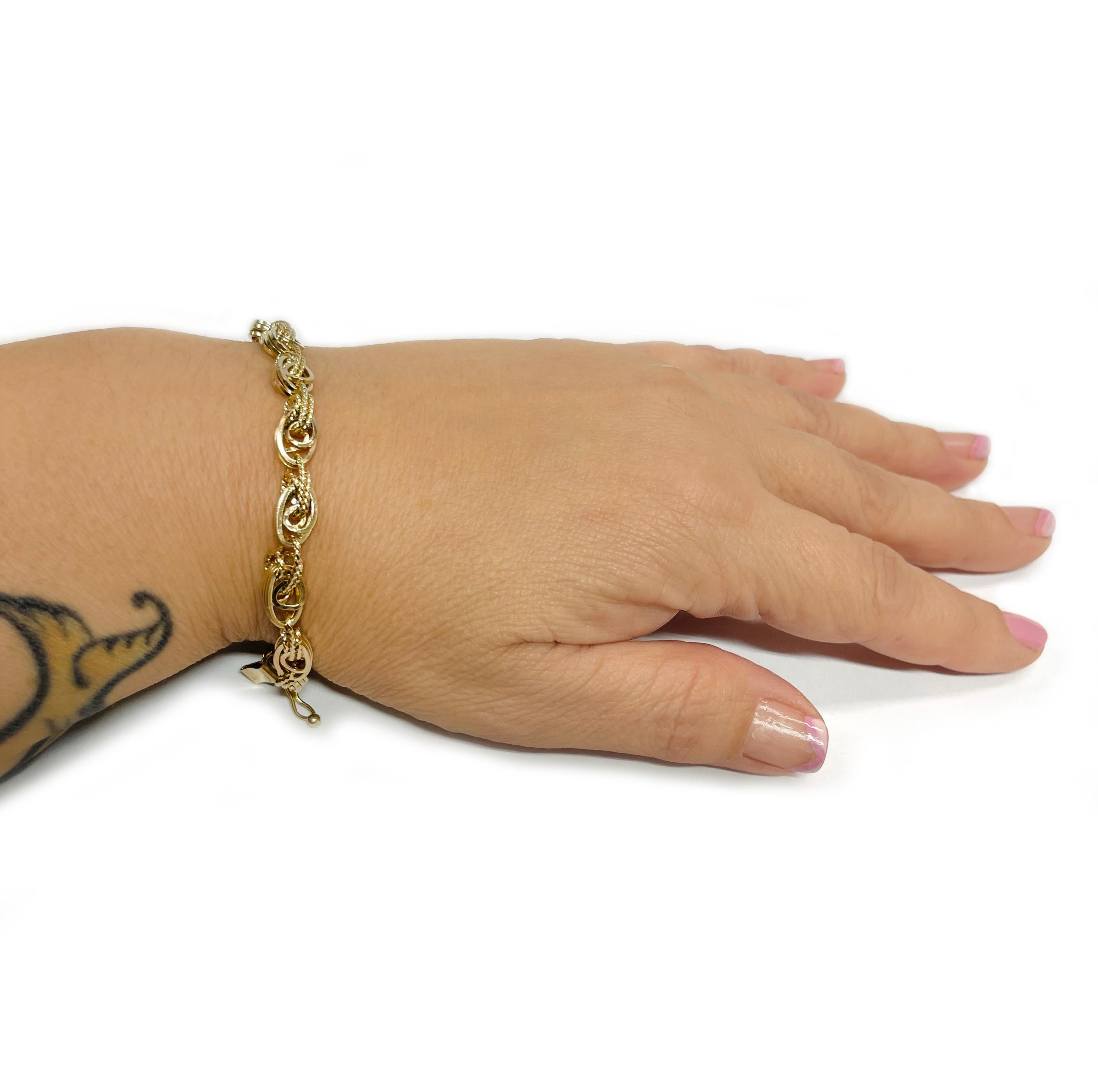 Bracelet en or jaune à trois maillons Bon état - En vente à Palm Desert, CA