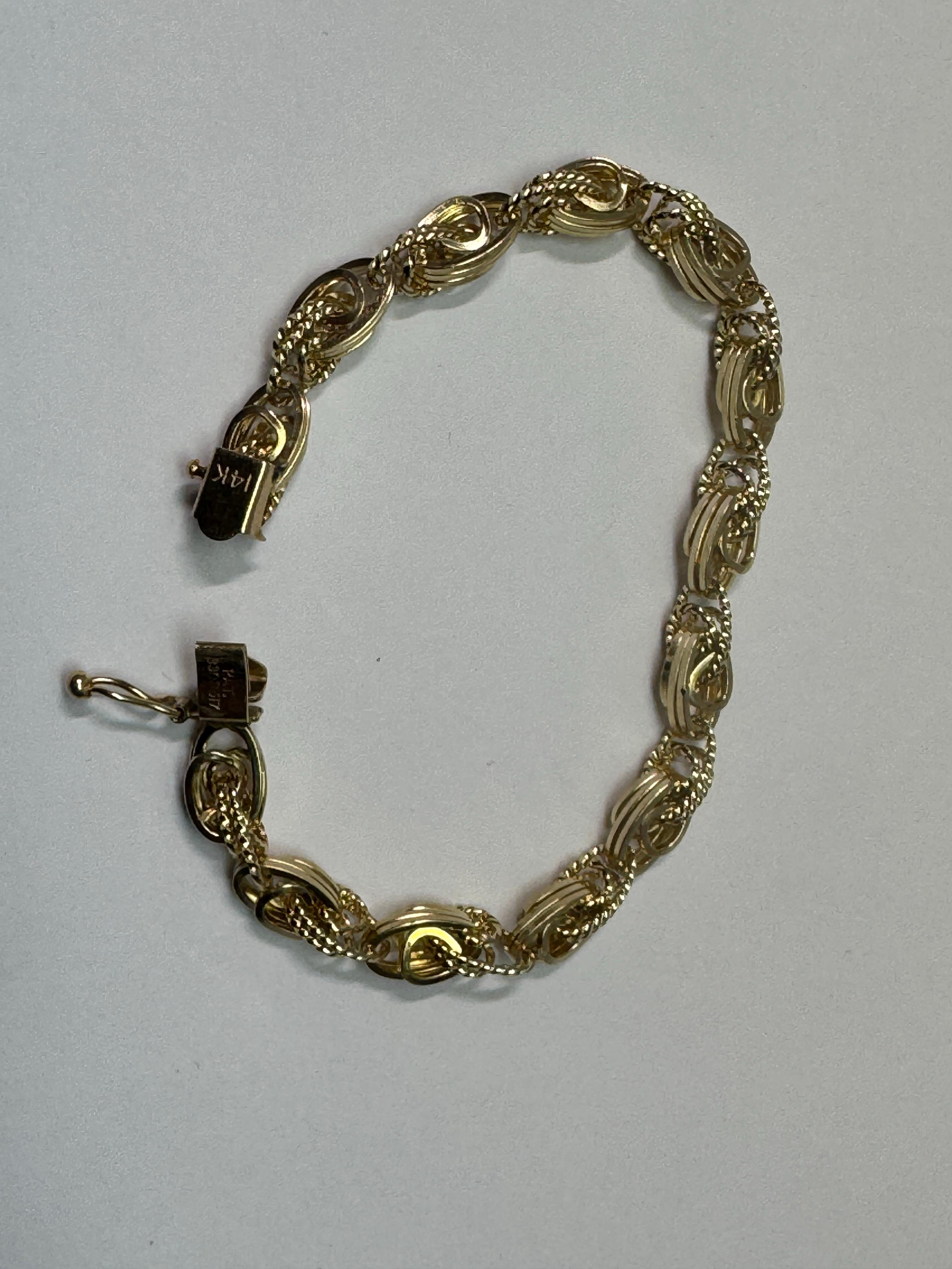 Bracelet en or jaune à trois maillons Unisexe en vente