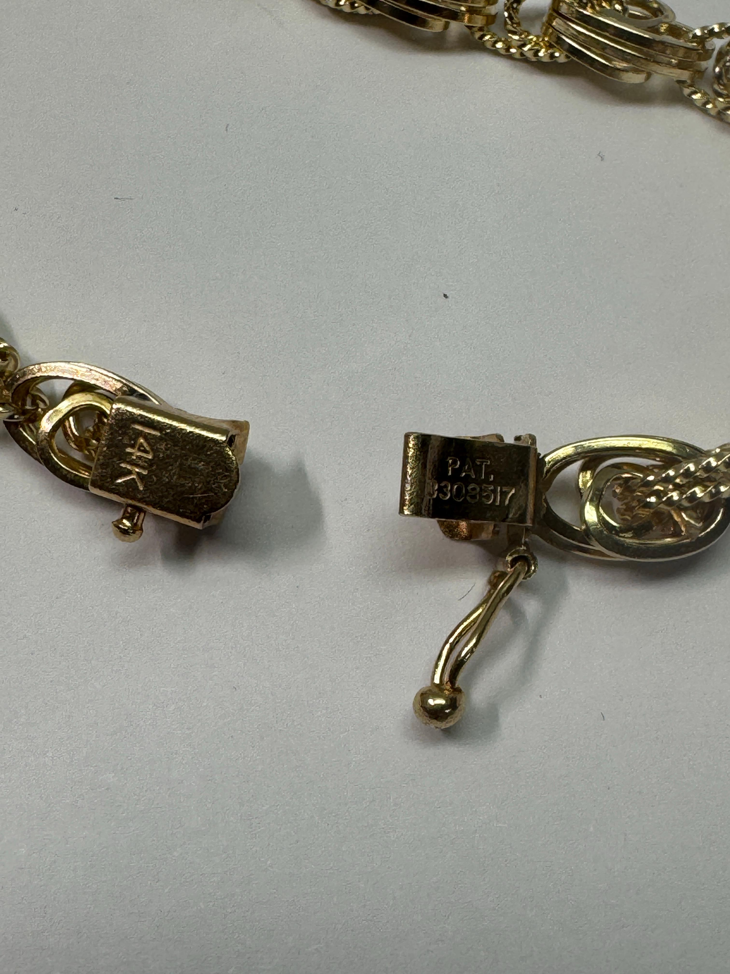 Bracelet en or jaune à trois maillons en vente 1