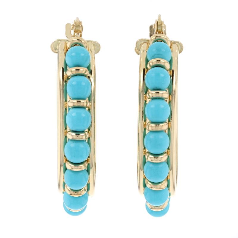 Metal Content: 18k Yellow Gold

Stone Information:
Genuine Turquoise Beads
Treatment: Routinely Enhanced
Color: Blue

Measurements: 
Tall: 1 3/32