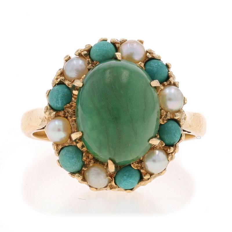 Size: 5
Sizing Fee: Up 2 1/2 sizes for $30 or Down 1 size for $30

Era: Vintage

Metal Content: 10k Yellow Gold

Stone Information

Natural Turquoise
Treatment: Routinely Enhanced
Cut: Oval Cabochon & Round Cabochon
Color: Green

Cultured