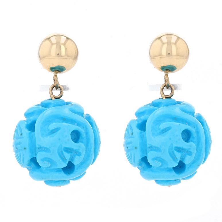 Metal Content: 14k Yellow Gold

Stone Information
Natural Turquoise
Treatment: Routinely Enhanced
Cut: Carved
Color: Blue

Style: Dangle
Fastening Type: Butterfly Closures
Features: Pierced

Measurements
Tall: 15/16