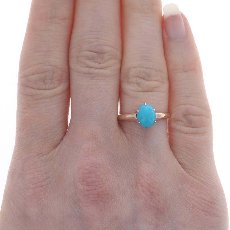 Size: 6 1/4
Sizing Fee: Up 3 sizes for $40 or Down 2 1/2 sizes for $35

Era: Vintage

Metal Content: 14k Yellow Gold

Stone Information

Natural Turquoise
Treatment: Routinely Enhanced
Cut: Oval Cabochon
Color: Blue

Style: