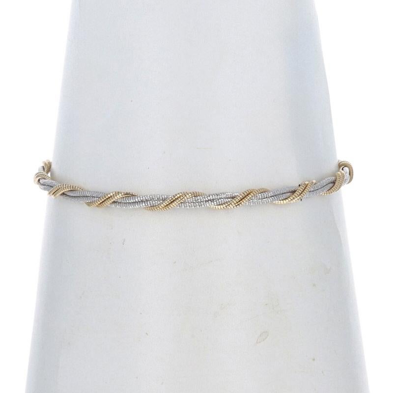 Contenu métallique : Or jaune 14k et or blanc 14k

Style de chaîne : Cocon et cocon taillé en diamant
Style de bracelet : Chaîne torsadée
Type de fermeture : Fermoir à griffe de homard

Mesures
Longueur : 6 3/4