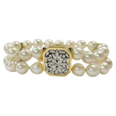 Zweireihiges Perlen-Diamant-Armband aus Gelbgold