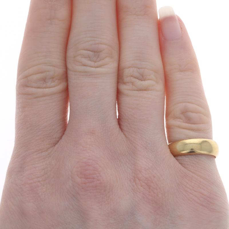Size: 4 3/4
Sizing Fee: Up 2 sizes for $80
Note: The resizing process may remove the interior engraving.

Era: Victorian
Date: 1880s - 1890s

Metal Content: 18k Yellow Gold

Style: Wedding Band without Stones
Features: Comfort Fit
