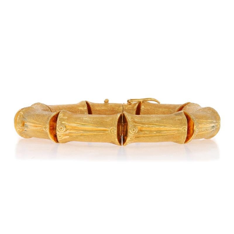 Era: Vintage

Metal Content: 18k Yellow Gold

Style: Link
Fastening Type: Tab Box Clasp with One Side Safety
Theme: Bamboo, Nature
Features: Brushed Detailing

Measurements

Length: 8