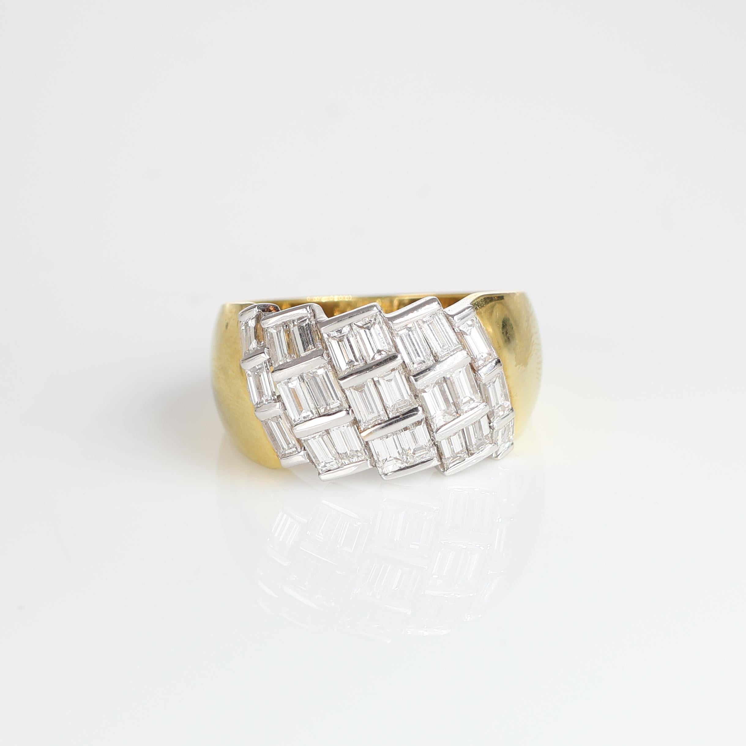 IMPORTANT NOTE:
✔ No additional costs will be added to this order.
✔ Shipping and customs duties are fully covered by us.
--------------------
This striking 18kt yellow gold band ring is adorned with a diagonal pattern of baguette-cut diamonds set