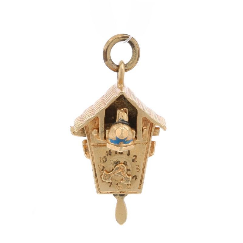 Era: Vintage

Metal Content: 14k Yellow Gold

Material Information
Enamel
Color: Blue

Theme: Cuckoo Clock, Blue Bird
Features: When the side button is pressed, the door opens to reveal the blue bird. The weight and watch hands also