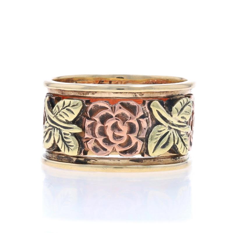 Size: 7

Era: Vintage

Metal Content: 14k Yellow Gold, 14k Rose Gold, & 14k Green Gold

Style: Statement Band
Theme: Flower Garland
Features: Design Spans the Entire Band's Perimeter

Measurements

Face Height (north to south): 7/16
