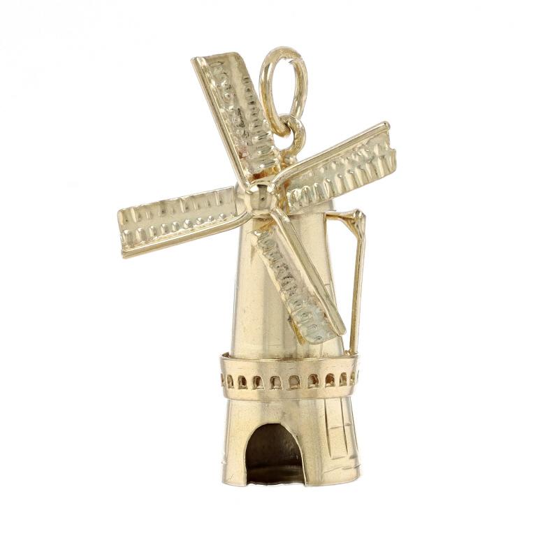 Era: Vintage

Metal Content: 14k Yellow Gold

Theme: Windmill
Features: The sails move

Measurements
Tall: 1 3/16
