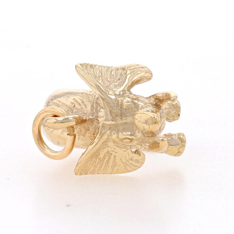 Metal Content: 14k Yellow Gold

Theme: Walking Elephant, Pachyderm

Measurements

Tall (from stationary bail): 19/32