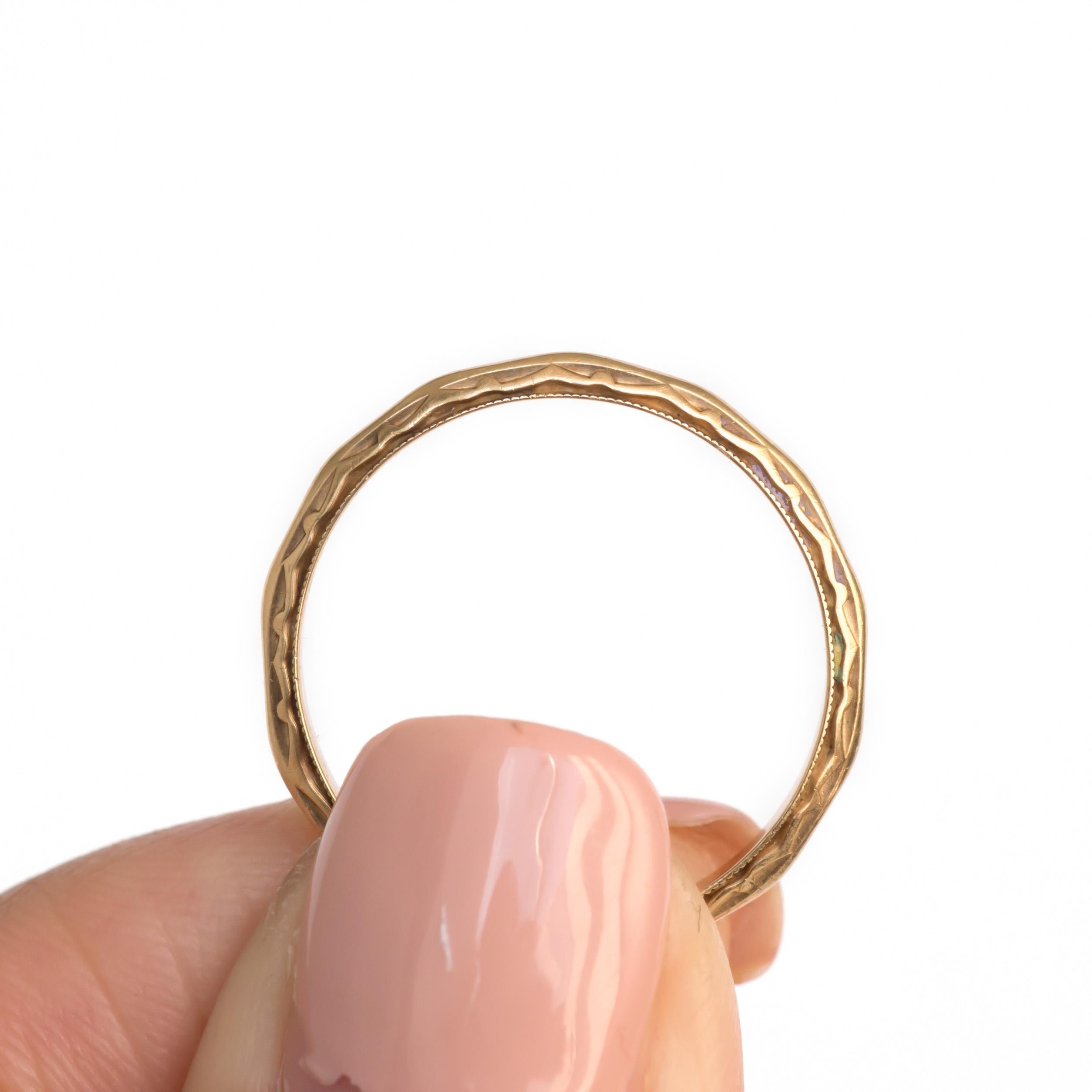 Ring Size: 5.25
Metal Type: 14K Yellow Gold
Weight: 1.6 grams

Finger to Top of Stone Measurement: 1.54mm
Width: 2.40mm