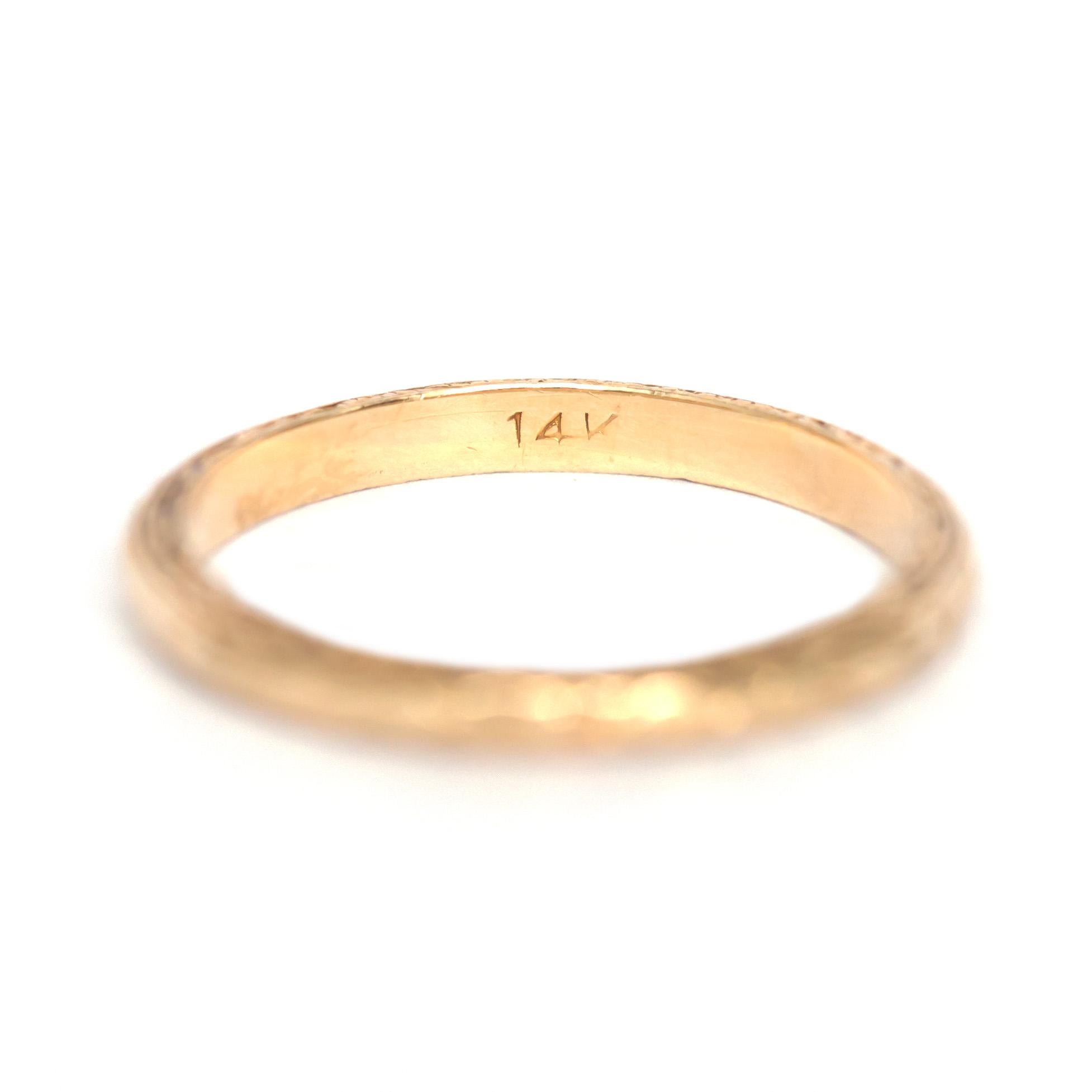 Item Details: 
Ring Size: 5
Metal Type: 14 karat Yellow Gold
Weight: 1.5 grams

Finger to Top of Stone Measurement: 1.40mm
Width: 2.08mm
Condition: Excellent