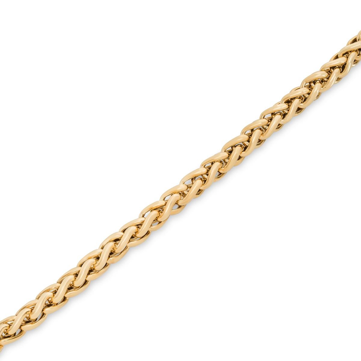 An 18k yellow gold link bracelet. The 7mm wide wheat chain bracelet measures 7.5 inches in length, finishes with a large lobster clasp and has a gross weight of 24.55 grams.

Comes complete with a RichDiamonds presentation box and our own