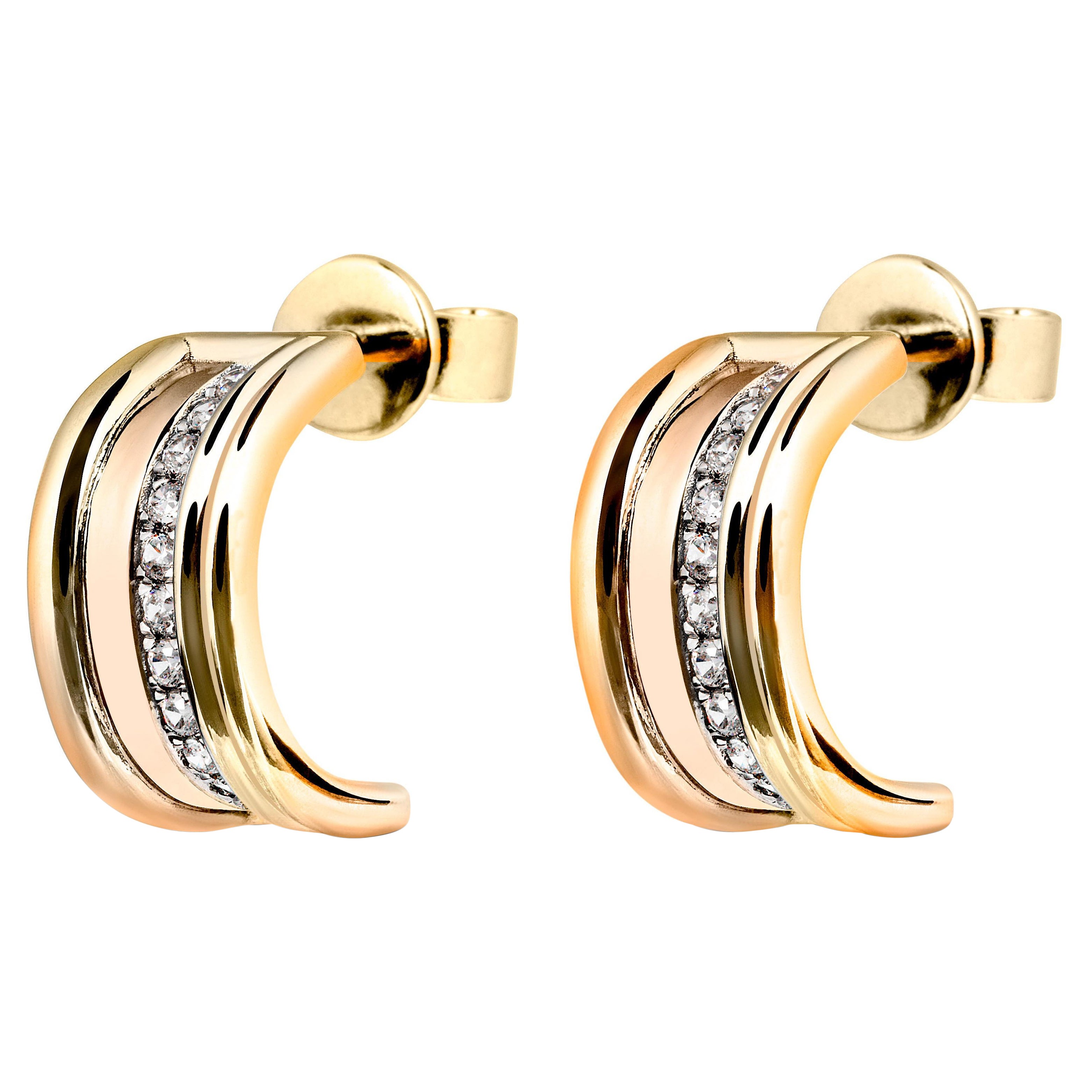 Orecchini a cerchio Queen in oro giallo e diamanti bianchi.